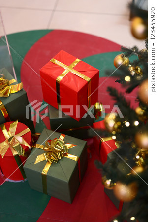 Delightful and Festive Christmas Gifts Placed Under the Beautiful Tree This Holiday Season Delightful and Festive Christmas Gifts Placed Under the Beautiful Tree This Holiday Season 123455920
