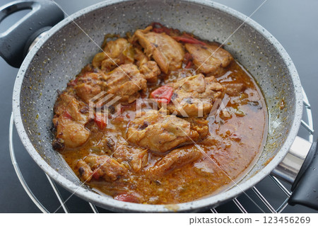This is a delicious and flavorful Chicken Curry, expertly made with various spices and sauces 123456269