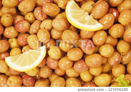 A beautiful arrangement of Fresh Jujubes complemented by bright Lemon Slices on Display 123456280