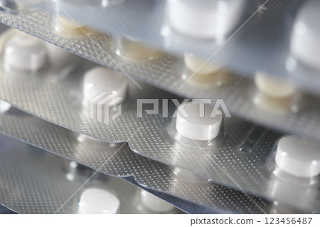 Close-up view of stacked medication tablets in blister packs Close-up view of stacked medication tablets in blister packs 123456487