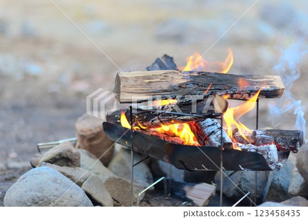 Burning charcoal at a campsite - bonfire scene - Burning charcoal at a campsite - bonfire scene - 123458435