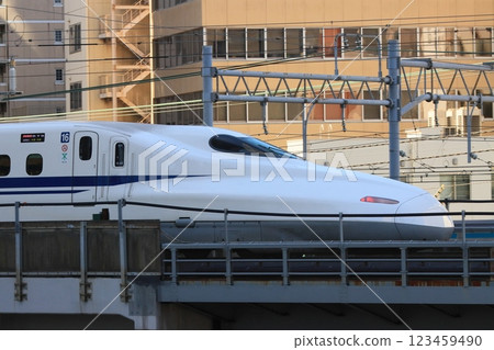 The Shinkansen is going. The front car of the Shinkansen The Shinkansen is going. The front car of the Shinkansen 123459490