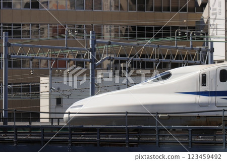 The Shinkansen is going. The front car of the Shinkansen The Shinkansen is going. The front car of the Shinkansen 123459492
