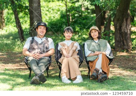 Parents and children/families chairing in parks and campsites Parents and children/families chairing in parks and campsites 123459710