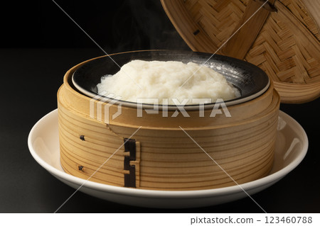 Steamed turnip in a bamboo steamer Steamed turnip in a bamboo steamer 123460788