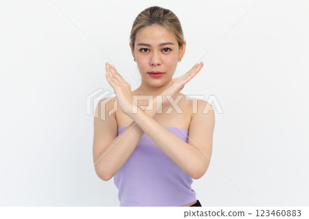 Asian woman making stop sign on white background 123460883