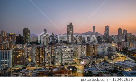 Feb 17 2025 Urban Skyline at Dusk with City Lights Illuminating 123462639