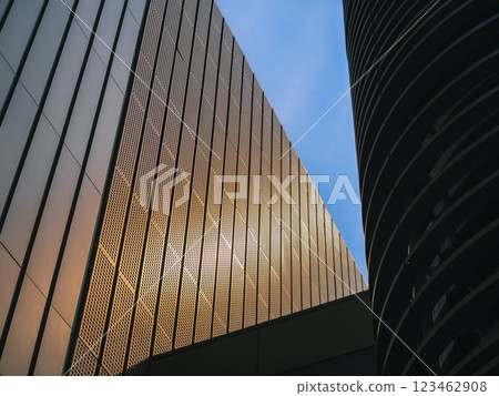 Modern building Metal facade Exterior shadow lighting contrast Architecture abstract Modern building Metal facade Exterior shadow lighting contrast Architecture abstract 123462908