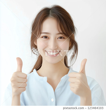 A young woman posing with both hands in "Like" position 123464103