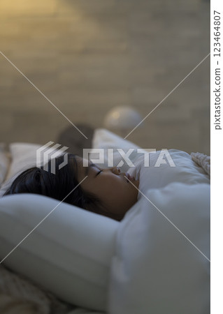 elementary school girl sleeping in bed 123464807