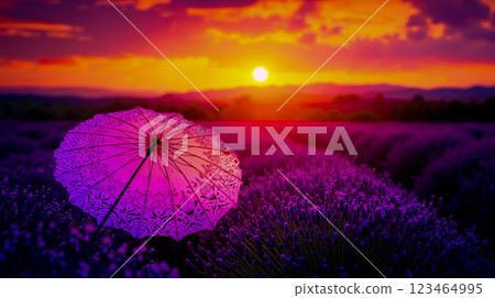 A purple umbrella sitting in the middle of a lavender field at sunset 123464995