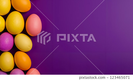 A bunch of colorful easter eggs on a purple background A bunch of colorful easter eggs on a purple background 123465071