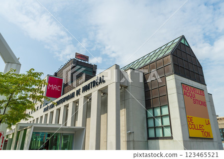 Montreal, Quebec, Canada - August 9 2021 : Museum of Contemporary Art of Montreal  seen from Place des Festivals plaza. 123465521