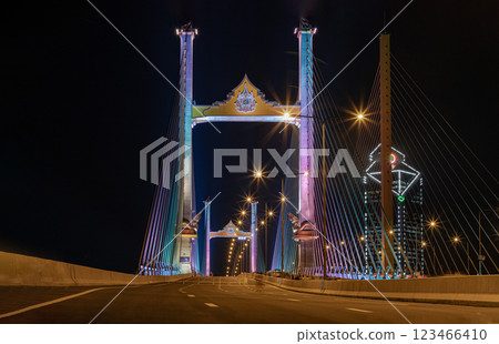 Beautiful scenery of Thotsamarachan Bridge (Rama IX Bridge) crossing Chao phraya river with evening sky in the background. Beautiful scenery of Thotsamarachan Bridge (Rama IX Bridge) crossing Chao phraya river with evening sky in the background. 123466410