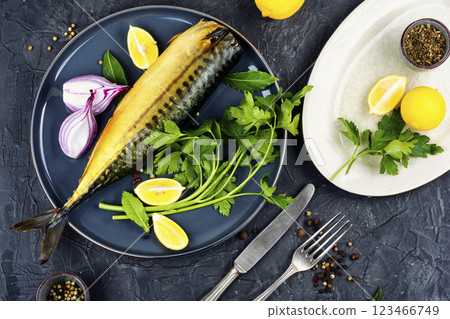 Hot-smoked headless mackerel. 123466749