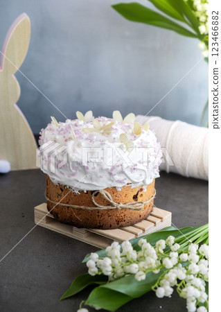 Homemade traditional Easter cake pastry bakery. Festive spring table setting decoration with fresh flowers eggs. Easter family dinner or breakfast idea Homemade traditional Easter cake pastry bakery. Festive spring table setting decoration with fresh flowers eggs. Easter family dinner or breakfast idea 123466882