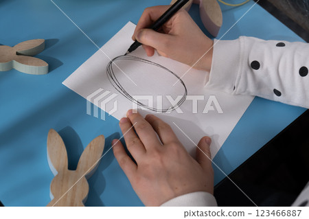 EASTER egg made of rope and feathers Sustainable preparation Diy process of making handmade greeting cards. Step by step activity for children. Inclusive and responsible stress relief holiday hobby 123466887
