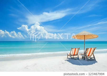 Beach chairs on the white sand beach with cloudy blue sky and sun Beach chairs on the white sand beach with cloudy blue sky and sun 123467994
