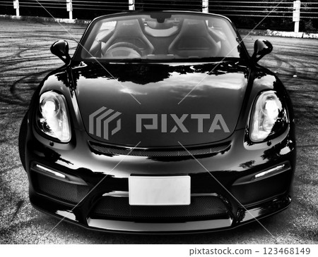 A shiny black convertible 123468149