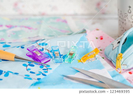 Fabric and clips for handmade accessories Fabric and clips for handmade accessories 123469395