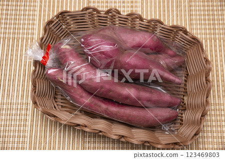 Sweet potatoes in a wire basket 123469803