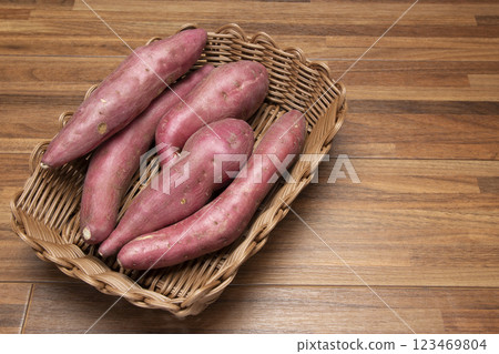 Sweet potatoes in a wire basket 123469804