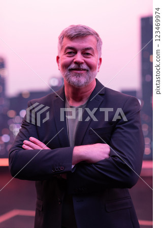 Confident Senior Gentleman with a Smile in an Urban Cityscape. 123469974