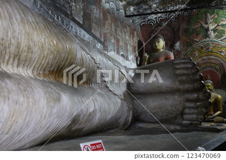 Reclining Buddha statue at Rangiri Dambulla Cave Temple [Sri Lanka] 123470069