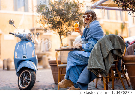 Stylish Italian Woman Enjoying Aperitivo 123470279