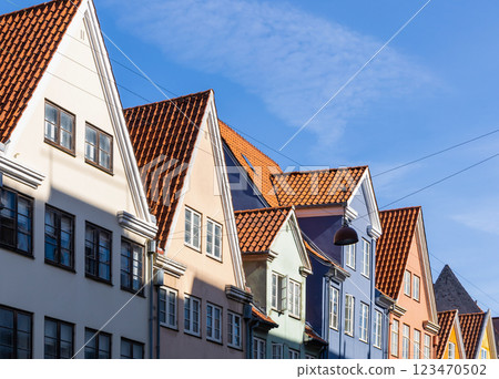 Downtown Copenhagen with old colored houses on a sunny day. Downtown Copenhagen with old colored houses on a sunny day. 123470502
