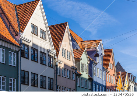 Downtown Copenhagen with old colored houses on a sunny day. Downtown Copenhagen with old colored houses on a sunny day. 123470536