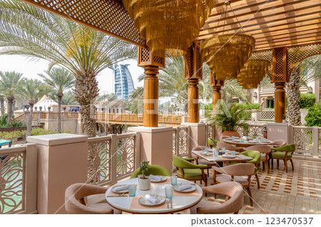 A restaurant with a view of the Burj al Arab in Dubai. A restaurant with a view of the Burj al Arab in Dubai. 123470537