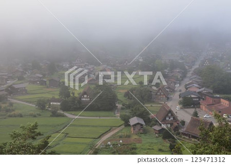 A village shrouded in mist A village shrouded in mist 123471312