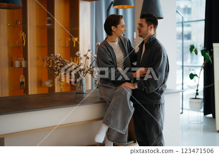Couple enjoying time together in modern interior space 123471506