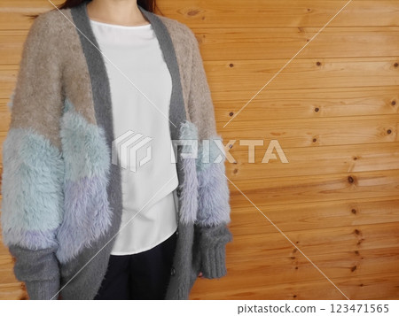 Woman wearing shaggy knit cardigan (no face) Woman wearing shaggy knit cardigan (no face) 123471565