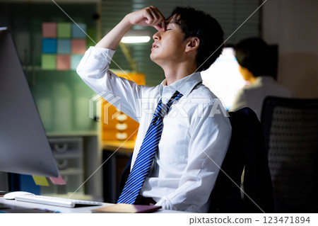 Overtime male business Overtime male business 123471894