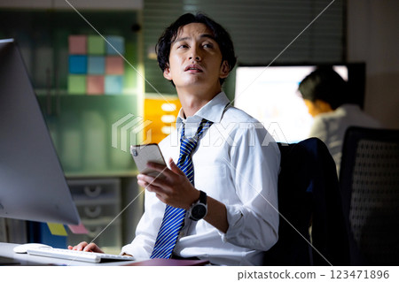 Overtime male business Overtime male business 123471896
