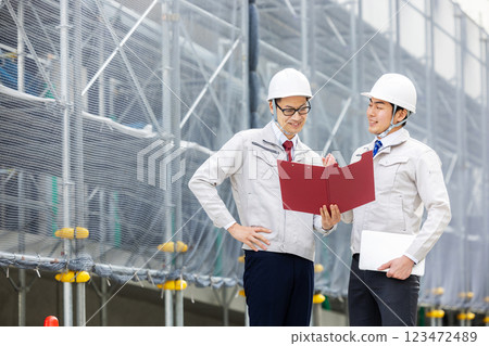 A general contractor in work clothes A general contractor in work clothes 123472489