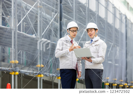 A general contractor in work clothes 123472502