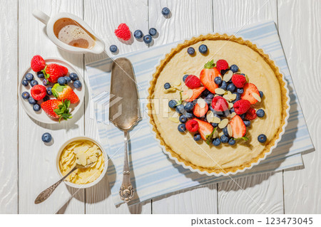Berry tart with marzipan crust and vegan filling Berry tart with marzipan crust and vegan filling 123473045