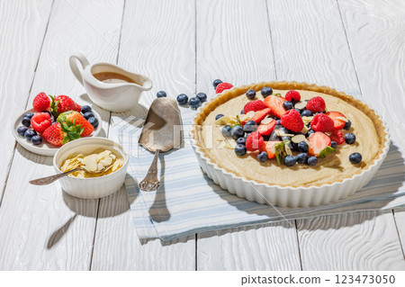 Berry tart with marzipan crust and vegan filling 123473050