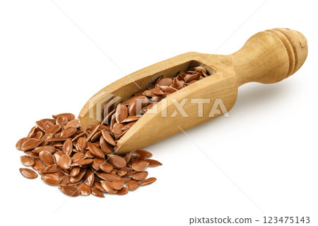 flaxseed in wooden scoop isolated on white background. flaxseed in wooden scoop isolated on white background. 123475143