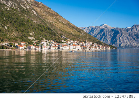 Panorama view of the historic town at famous Bay of Kotor with boats in winter time Panorama view of the historic town at famous Bay of Kotor with boats in winter time 123475893