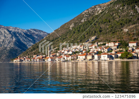 Panorama view of the historic town at famous Bay of Kotor with boats in winter time Panorama view of the historic town at famous Bay of Kotor with boats in winter time 123475896