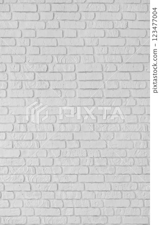 White color painted brick wall texture, brickwork, masonry of stone blocks vertical background White color painted brick wall texture, brickwork, masonry of stone blocks vertical background 123477004
