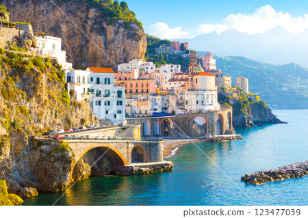 Beautiful view of Amalfi on the Mediterranean coast with lemons in the foreground, Italy 123477039