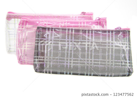 Multicolored pencil pen case container isolated on the white background Multicolored pencil pen case container isolated on the white background 123477562