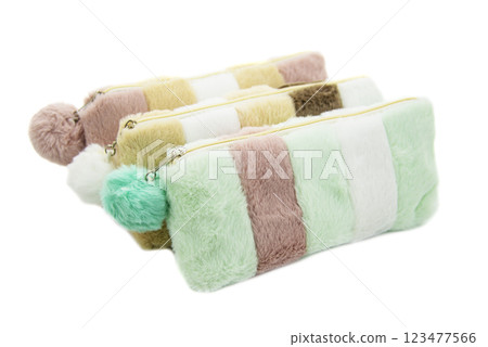 Multicolored pencil pen case container isolated on the white background 123477566