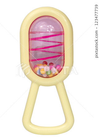 Baby rattle toy for baby violet isolated on the white background Baby rattle toy for baby violet isolated on the white background 123477739