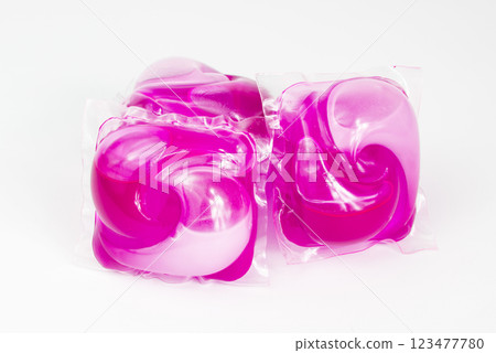 Washing multicolor gel liquid powder capsule isolated on the white background 123477780
